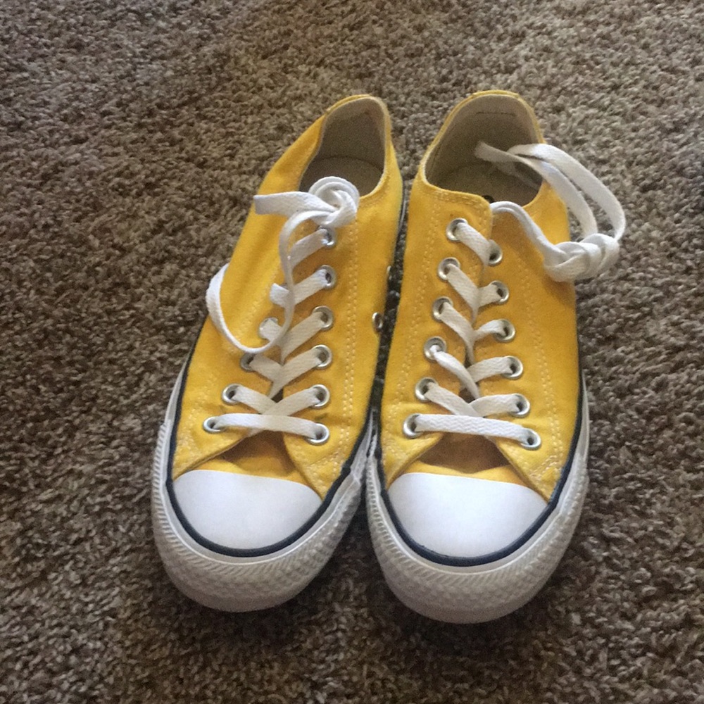 Yellow converse shoes